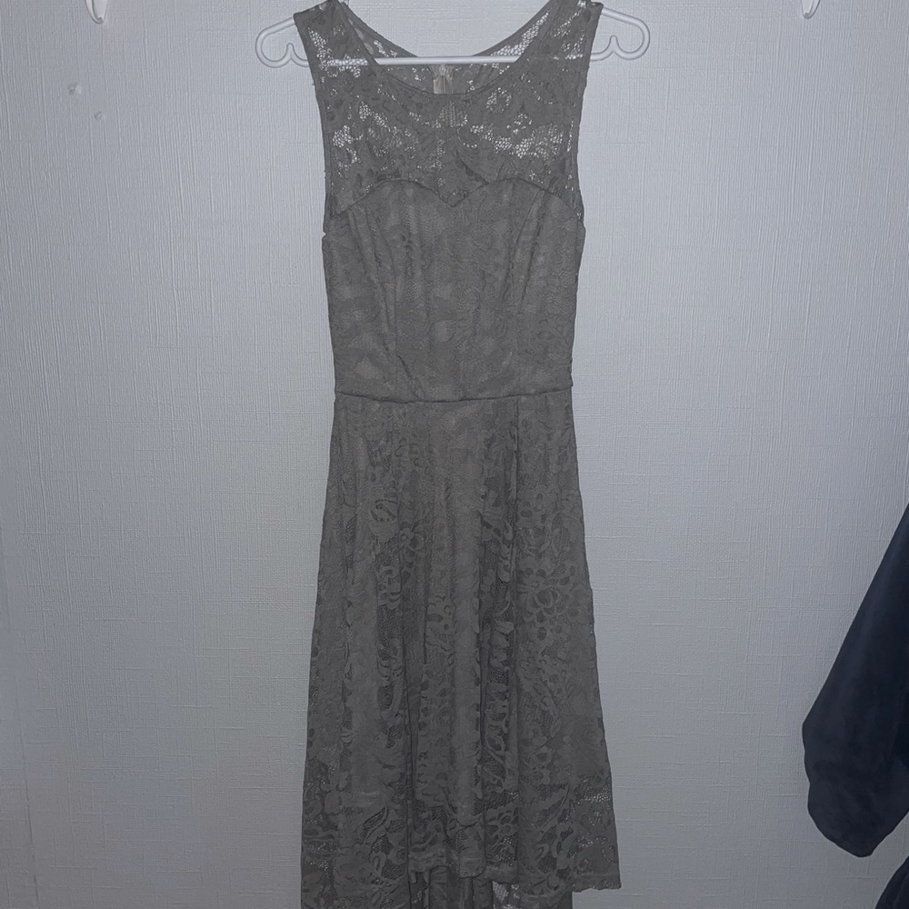 Cute grey dress with floral lace details.